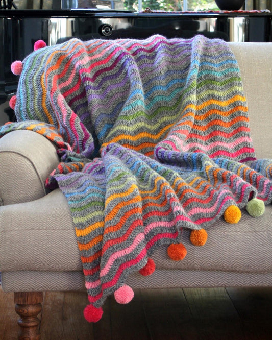 Haley with pink pom pom pouf