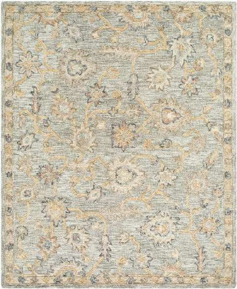 An area rug with a distressed traditional floral pattern in muted tones of gray, beige, and soft blue.