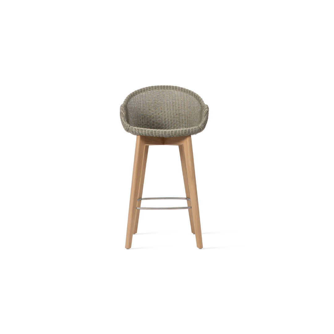 Light green counter stools in delicate Lloyd Loom weave with a beautifully crafted oak wood base.