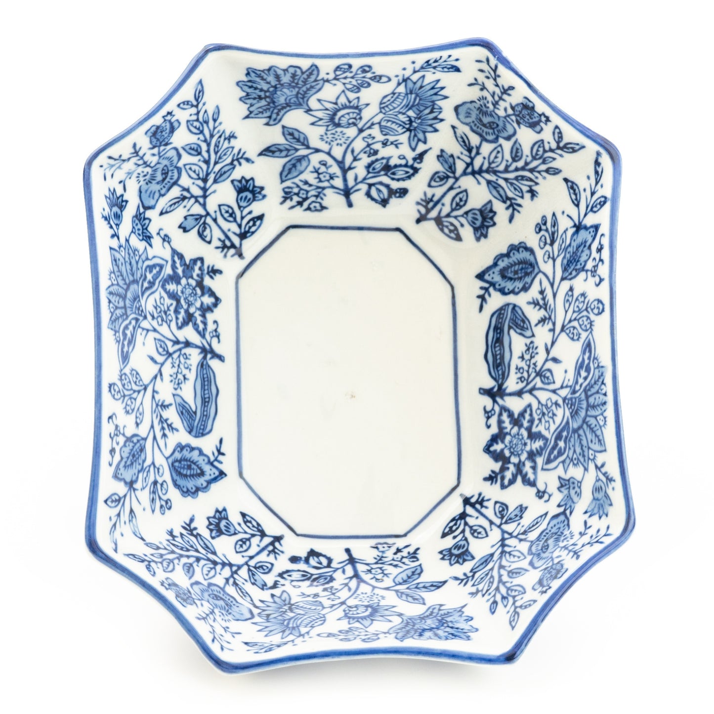 Decorative plate with blue floral pattern on a white background