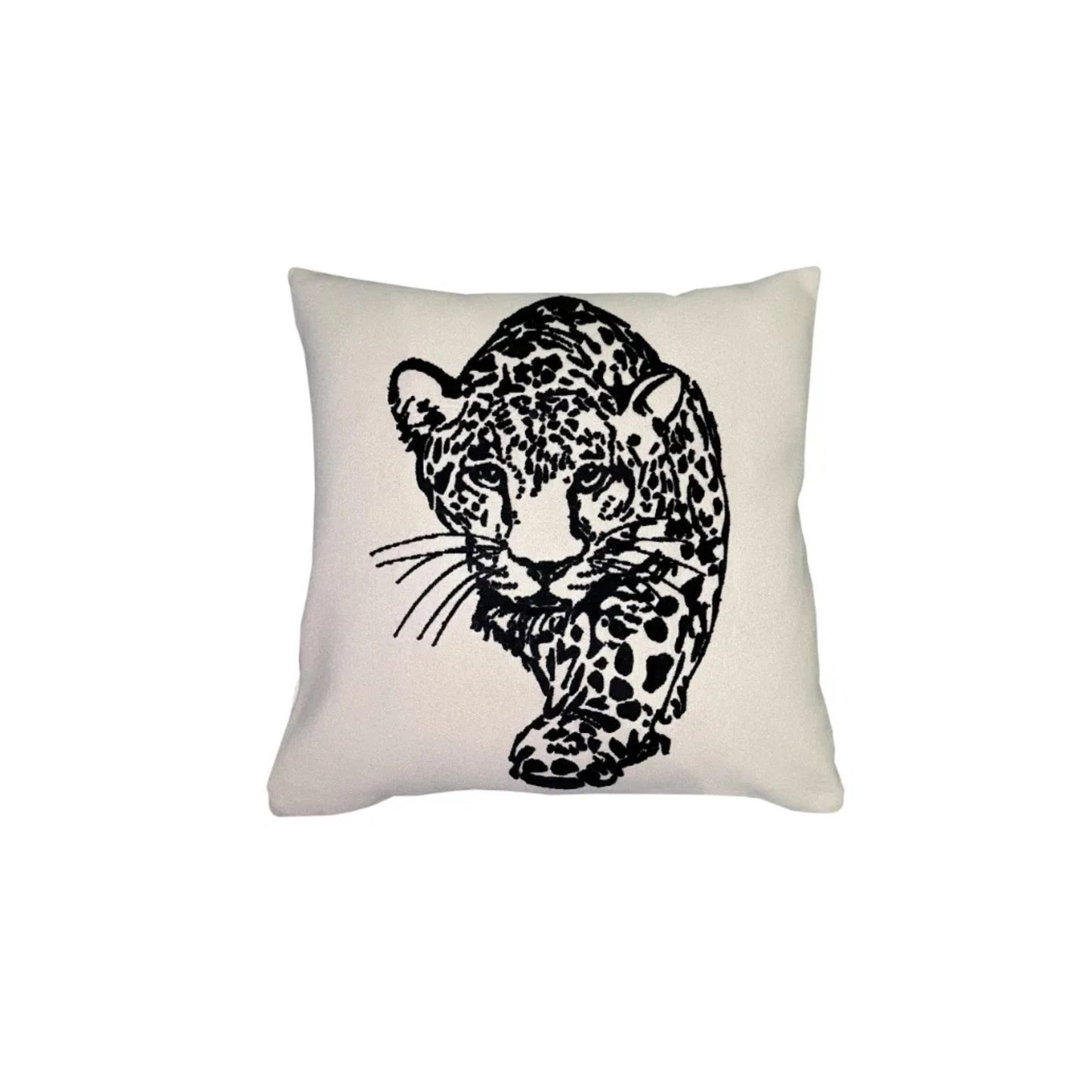 A square cushion with a black embroidered tiger design on a cream background.