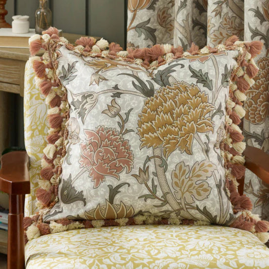 Decorative pillow with floral pattern on a chair