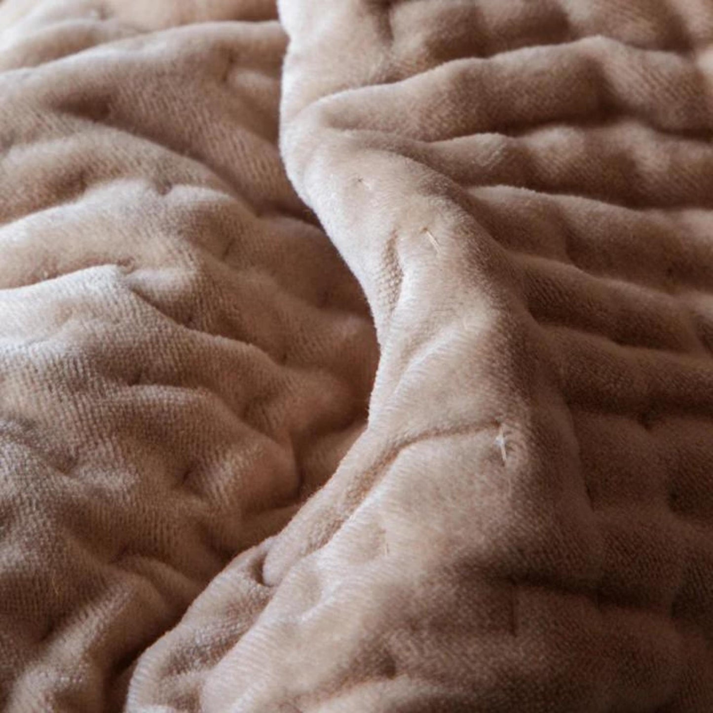 Up close Detail of dusky pink velvet throw blanket
