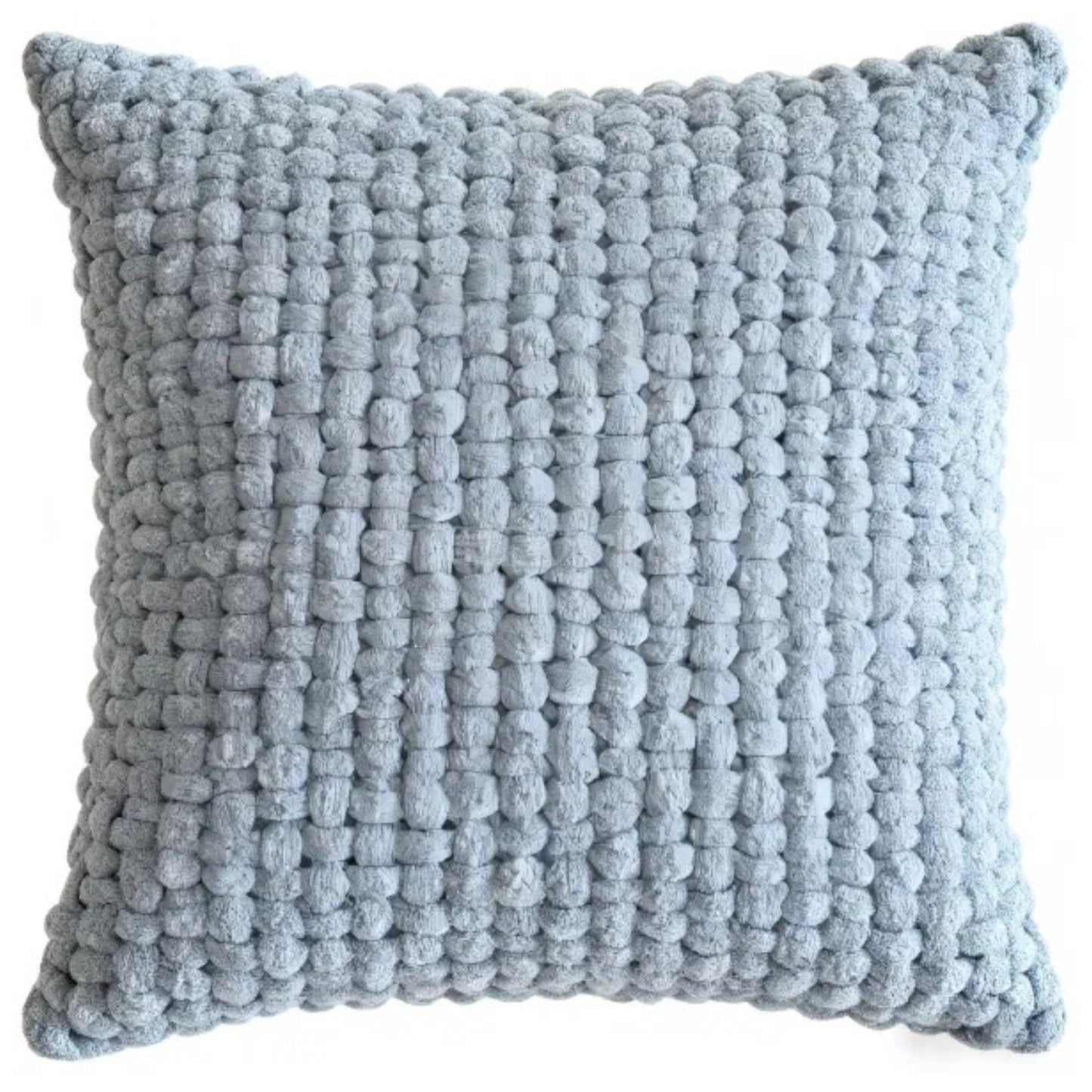 Textured blue pillow on a white background