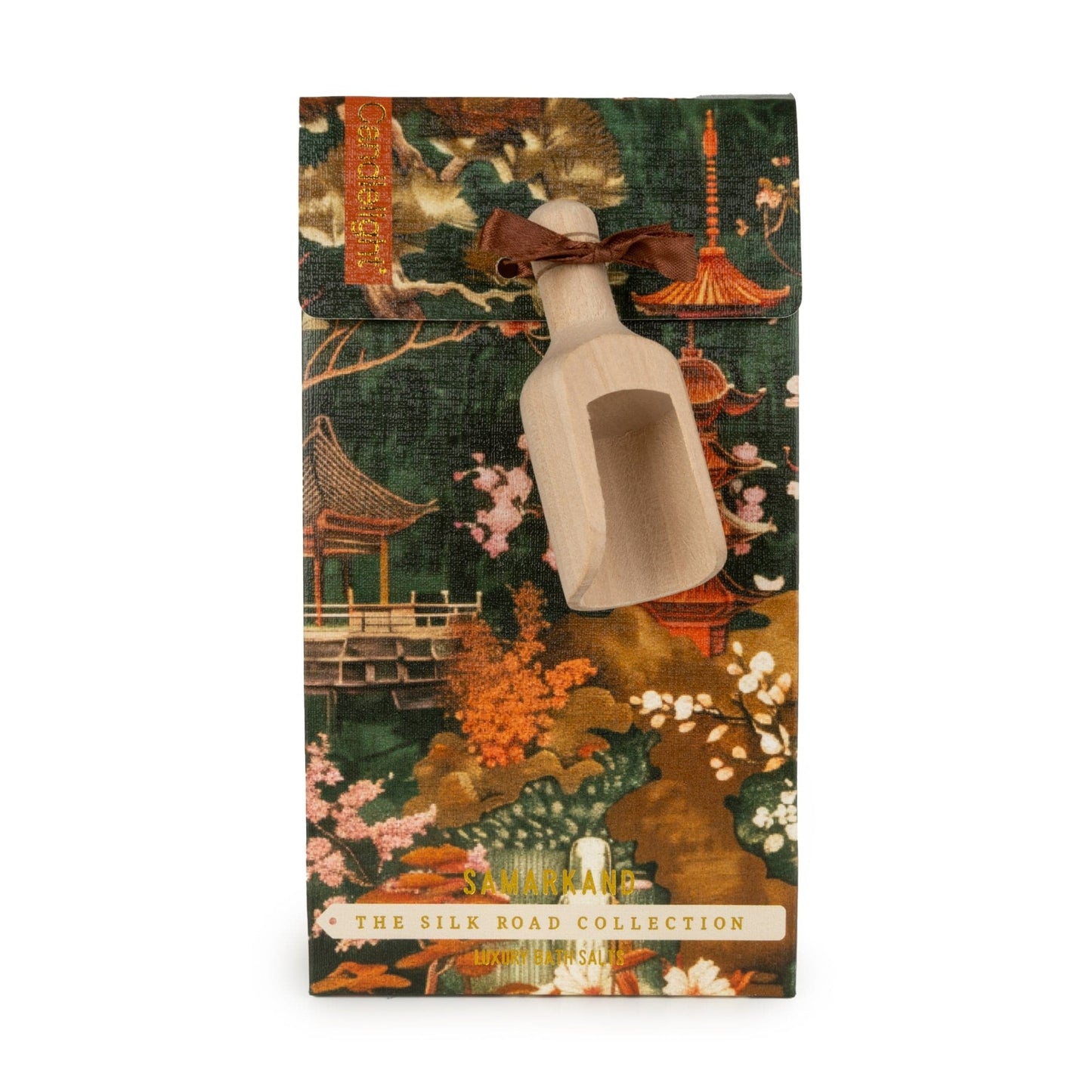 Oriental green and orange print gift bag of bath salts with wooden scoop