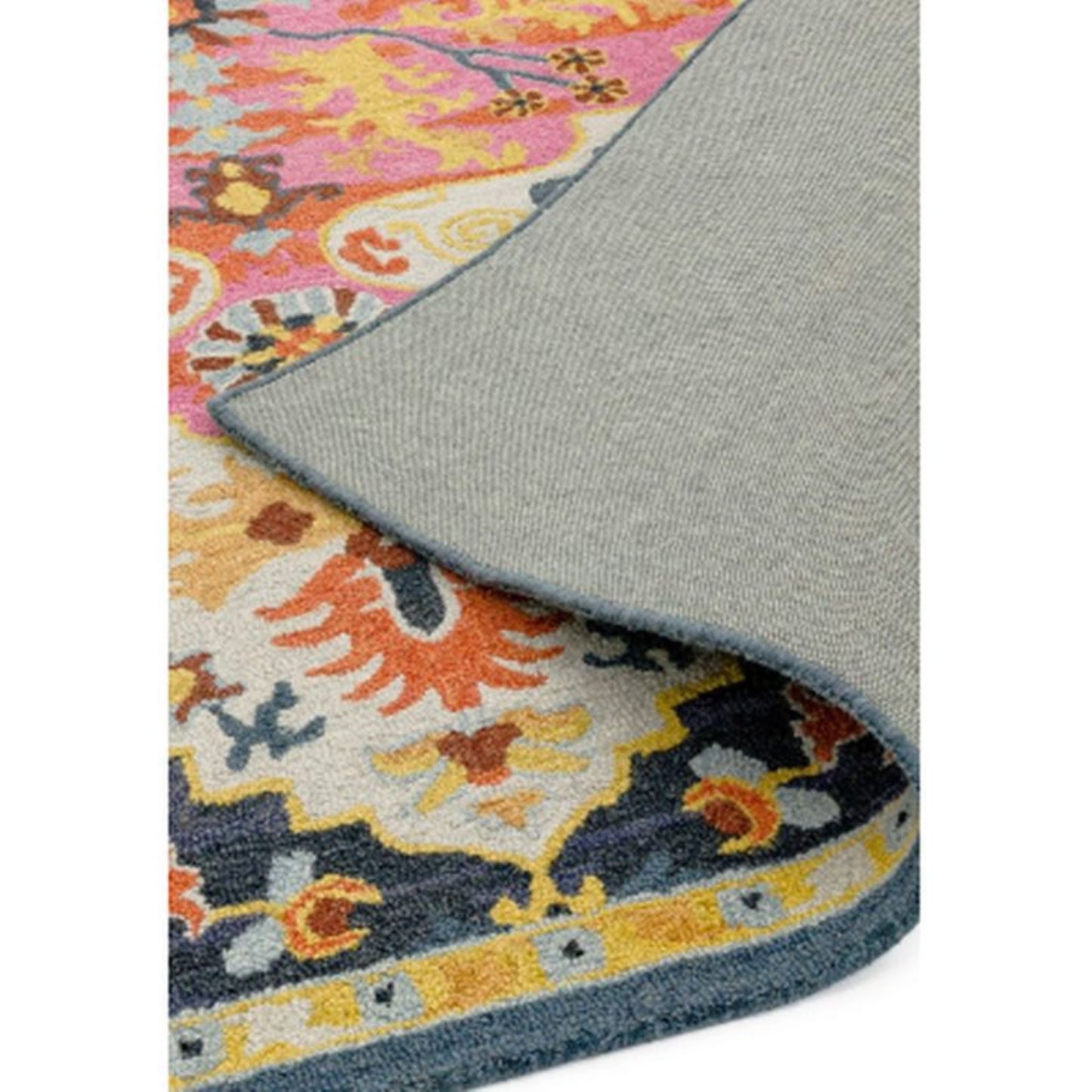 multicolour rug folded back at the corner