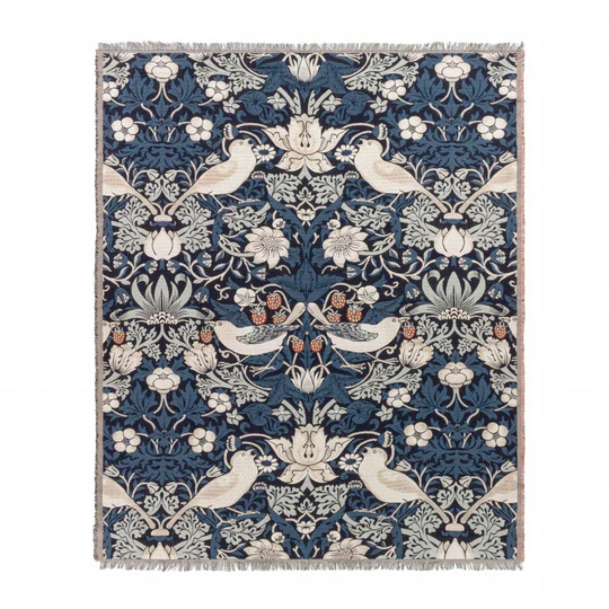Decorative throw blanket with floral and bird pattern on a blue background