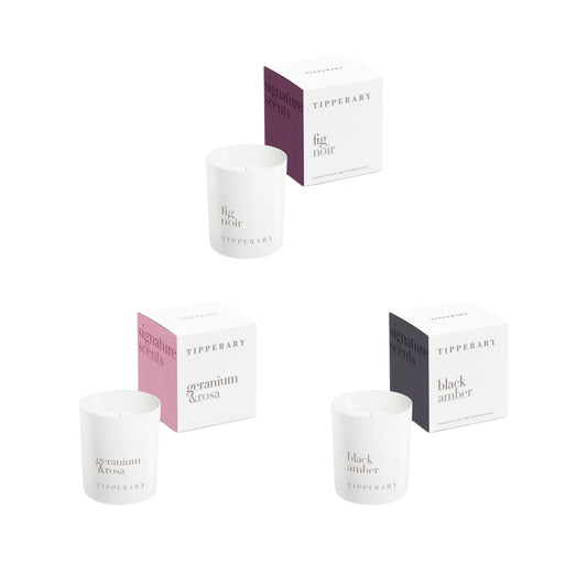 Set of Tipperary candles and their packaging on a white background