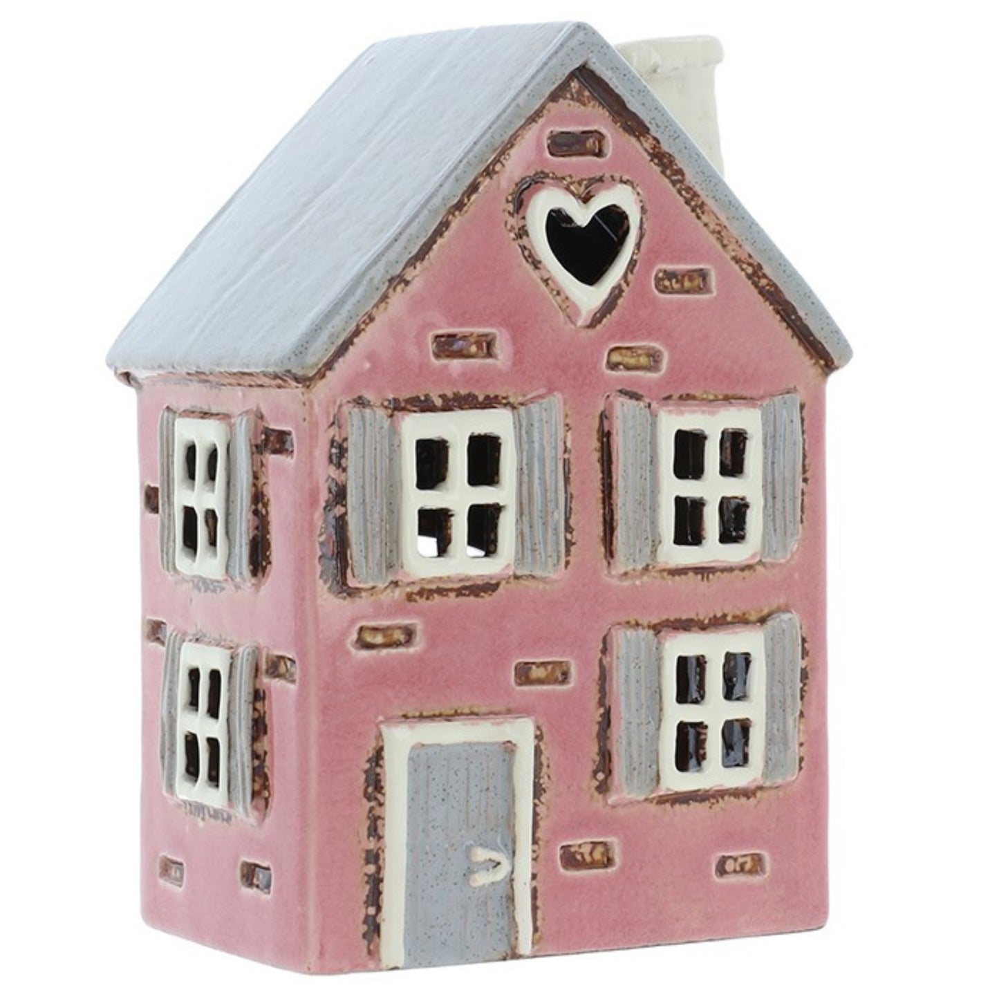 Pink ceramic house with a heart window on a white background