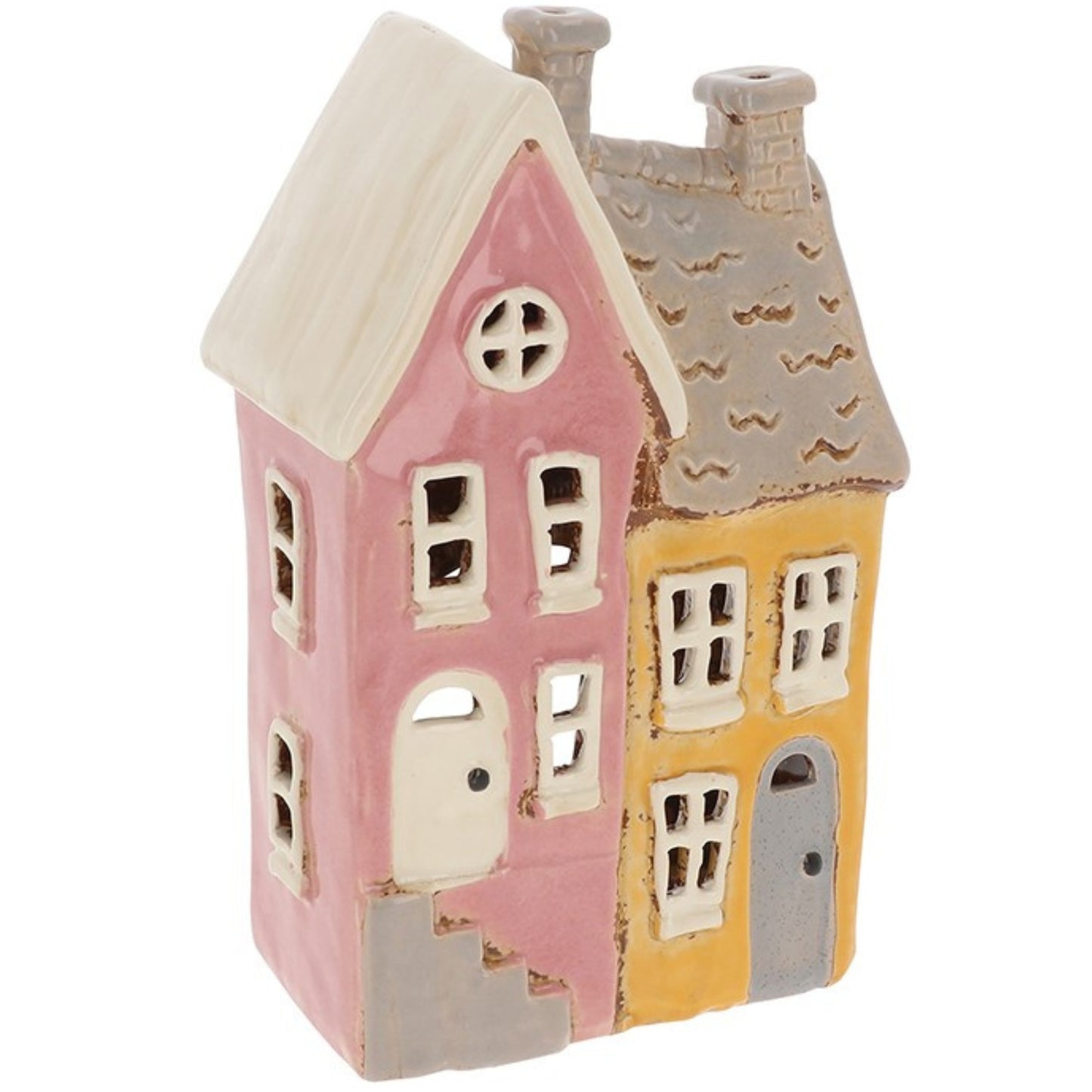 Small ceramic house-shaped lantern with pink and yellow sides on a white background