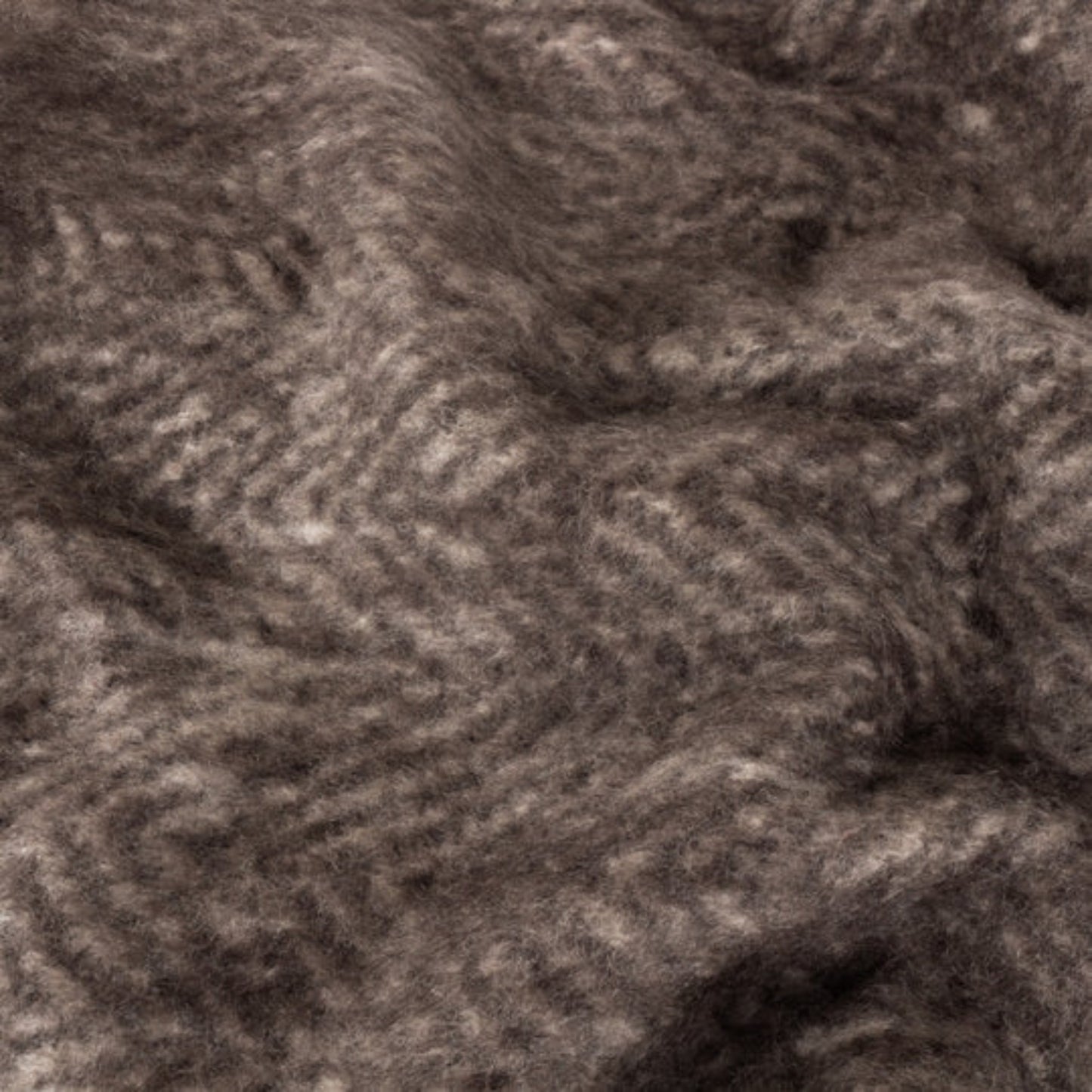 Close-up of brown textured wool blend throw