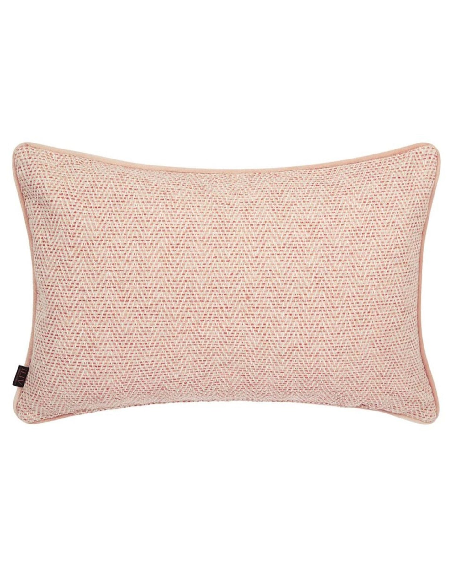 A rectangular floral cushion with a soft pink zig zag pattern, piped with a pink trim.