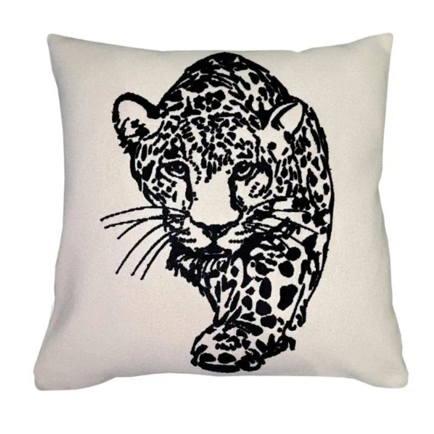 A square cushion with a black embroidered tiger design on a cream background.