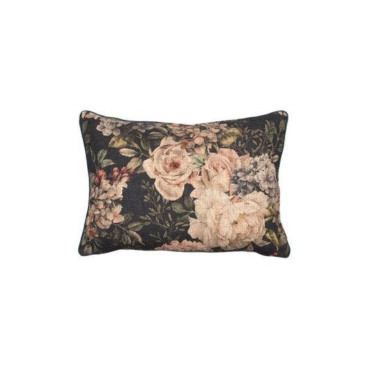 A rectangular floral linen cushion with a design of various flowers in shades of pink, cream, and green on a grey background.