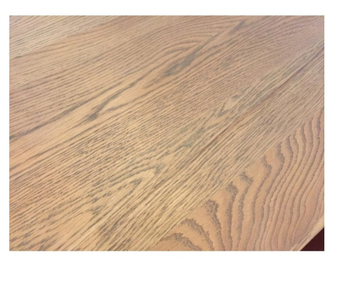 Oak finish detail from oak dining table top