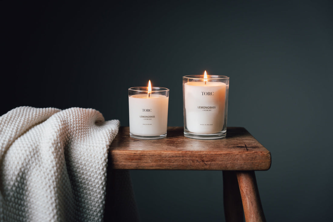 Torc Atelier Lemongrass & Jasmine candle and reed diffuser styled in a living room