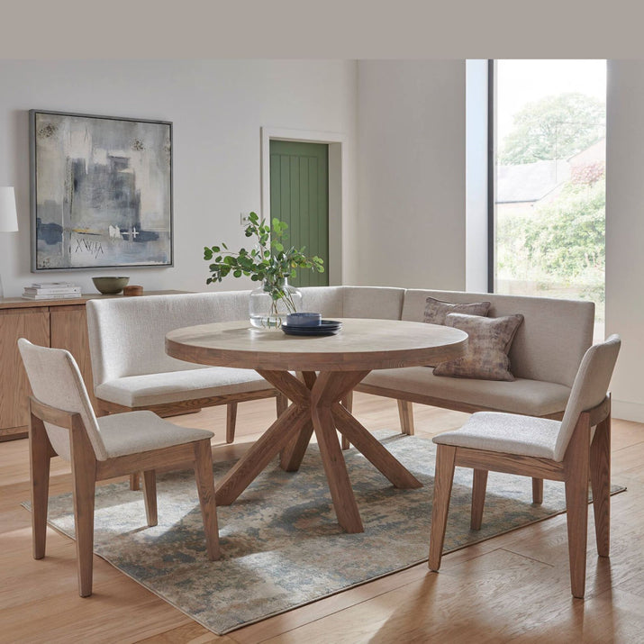 Add sophistication and style to your dining room and living space with the Frida range of furniture. Crafted from oak this contemporary design with it is versatile seating options will bring function and elegance to your space.undefined