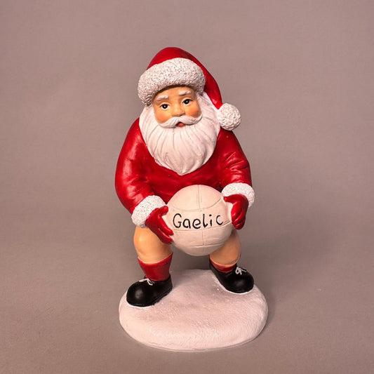 Santa with Gaelic football figurine