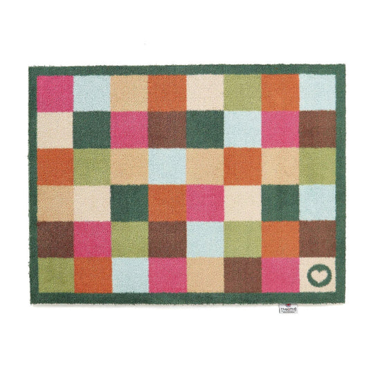Hug Rug Mat with check design features a grid of brightly coloured square which include Browns, light blue, leaf green, pink and orange. This is surrounded with a dark green border.