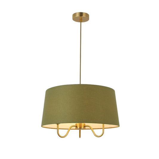 Pendant light with green shade and gold fixture on a white background