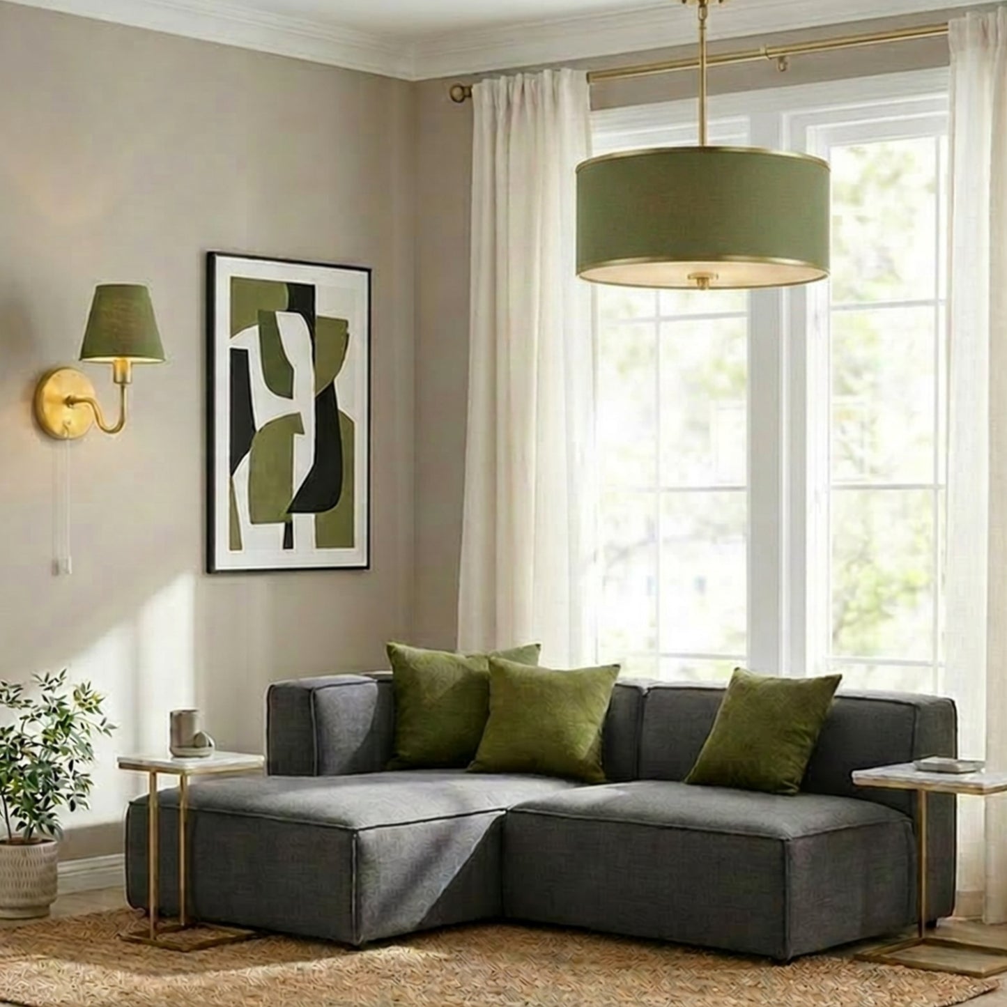 Modern living room with a gray sectional sofa, green cushions, and decorative elements.