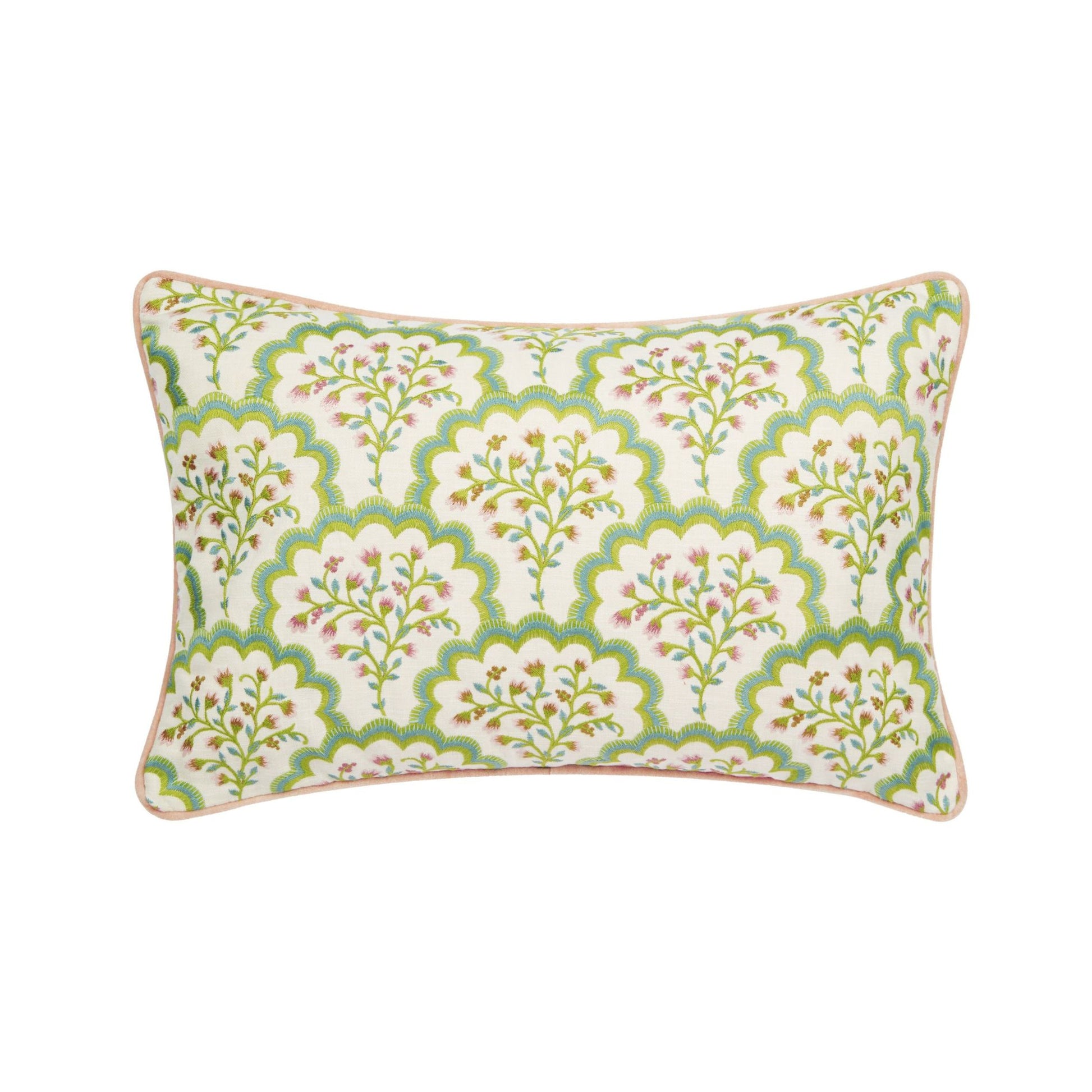 A rectangular floral cushion with a green, aqua, and pink pattern, piped with a green trim.