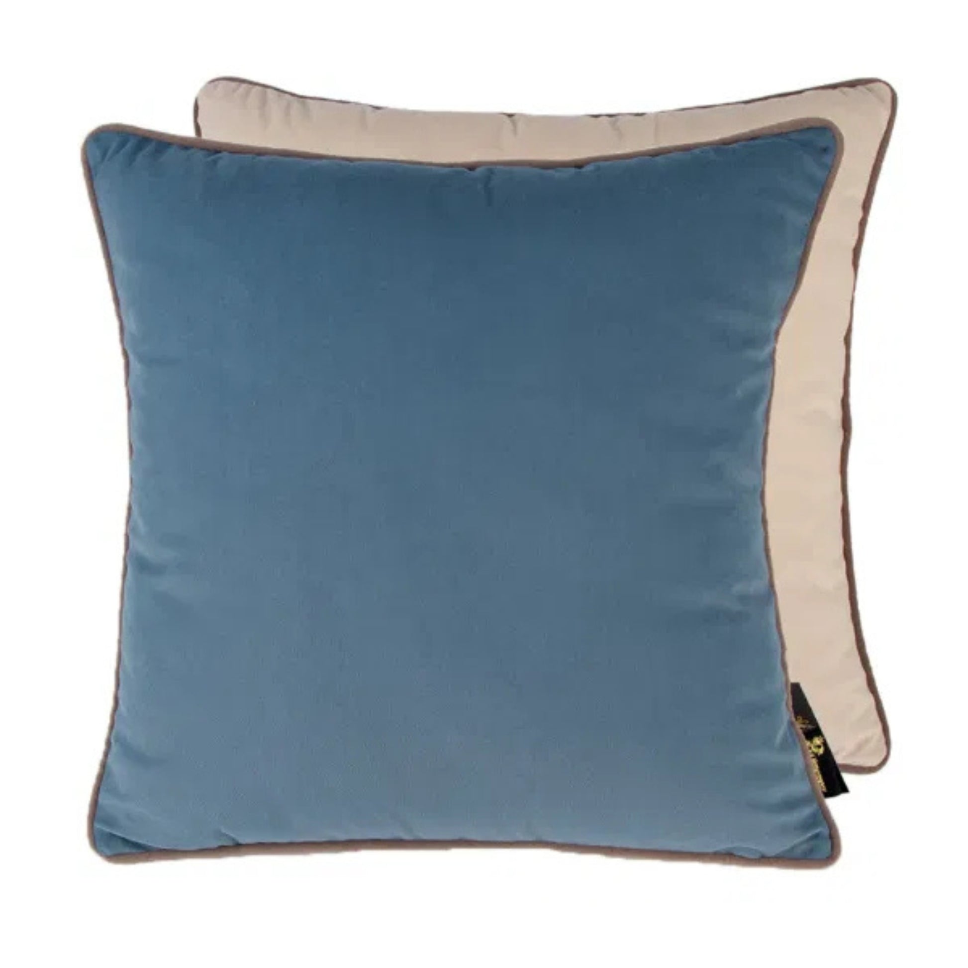A large square cushion with one half in blue velvet and the other half in champagne velvet, both with taupe piping.
