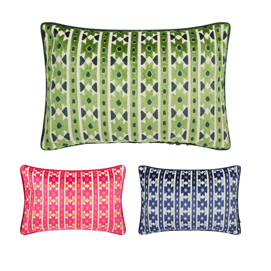 Rectangular cushions with a geometric pattern and accent piping, in pink, green and navy colourways
