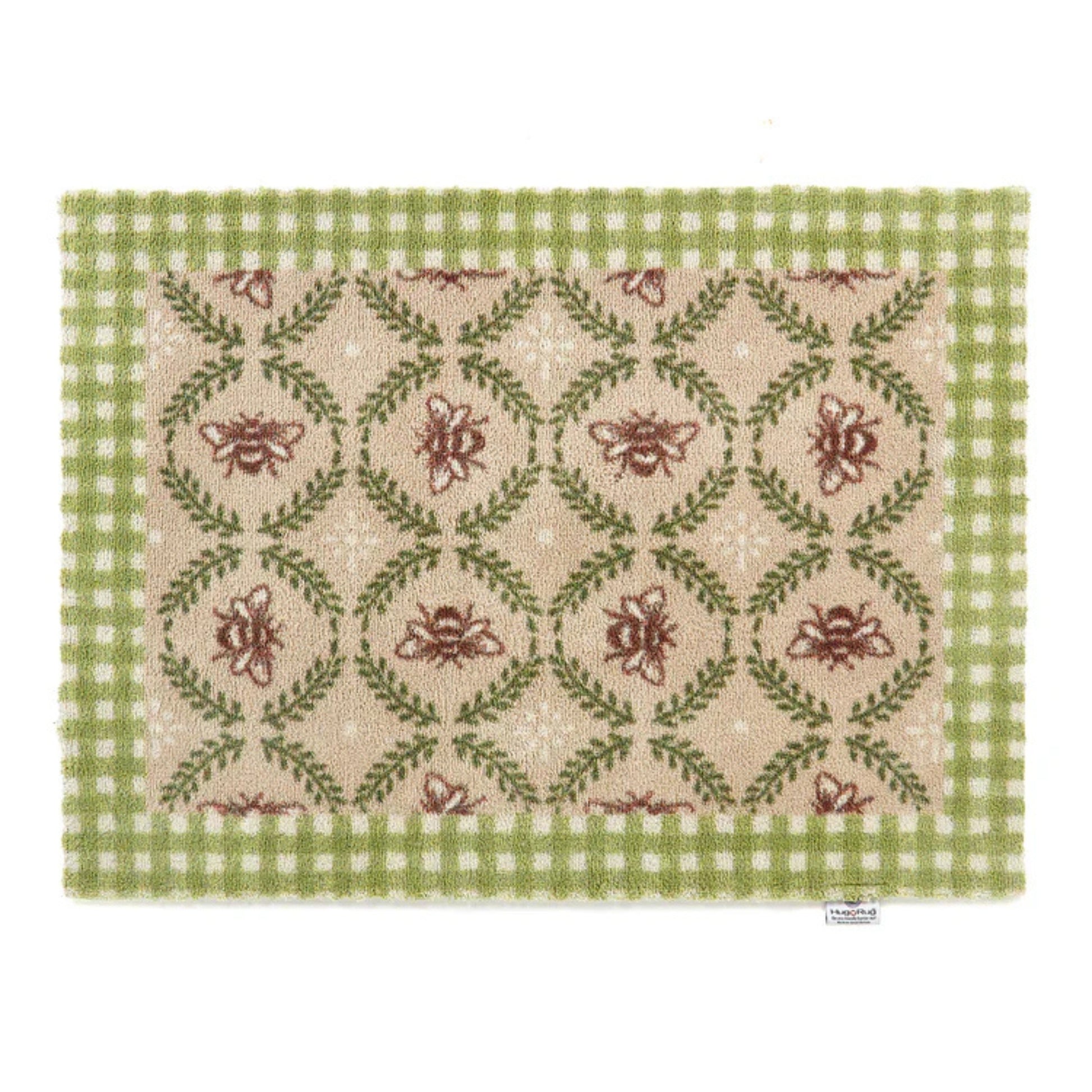 Decorative placemat with floral pattern and green checkered border on a white background