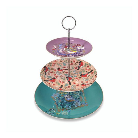 Three-tiered decorative cake stand with colorful designs on a white background