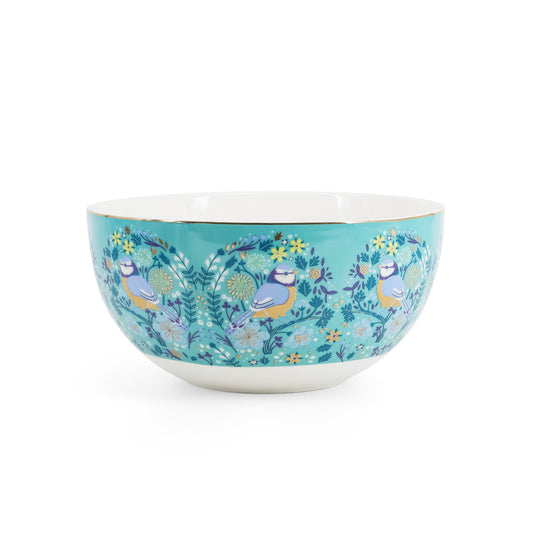 Decorative bowl with bird and floral design on a white background