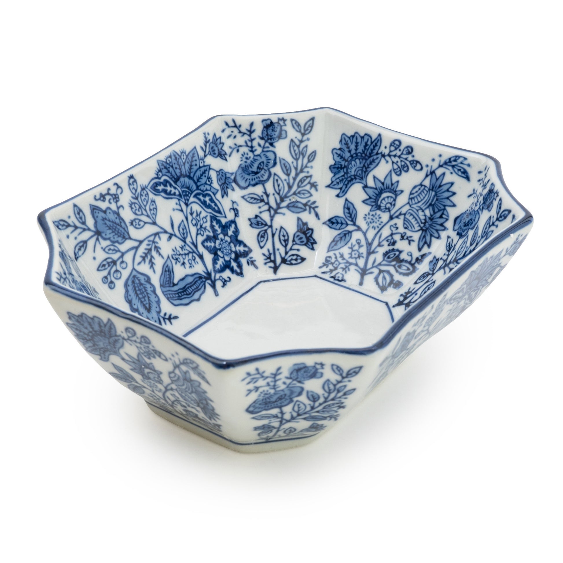 Hexagonal ceramic bowl with blue floral pattern on a white background