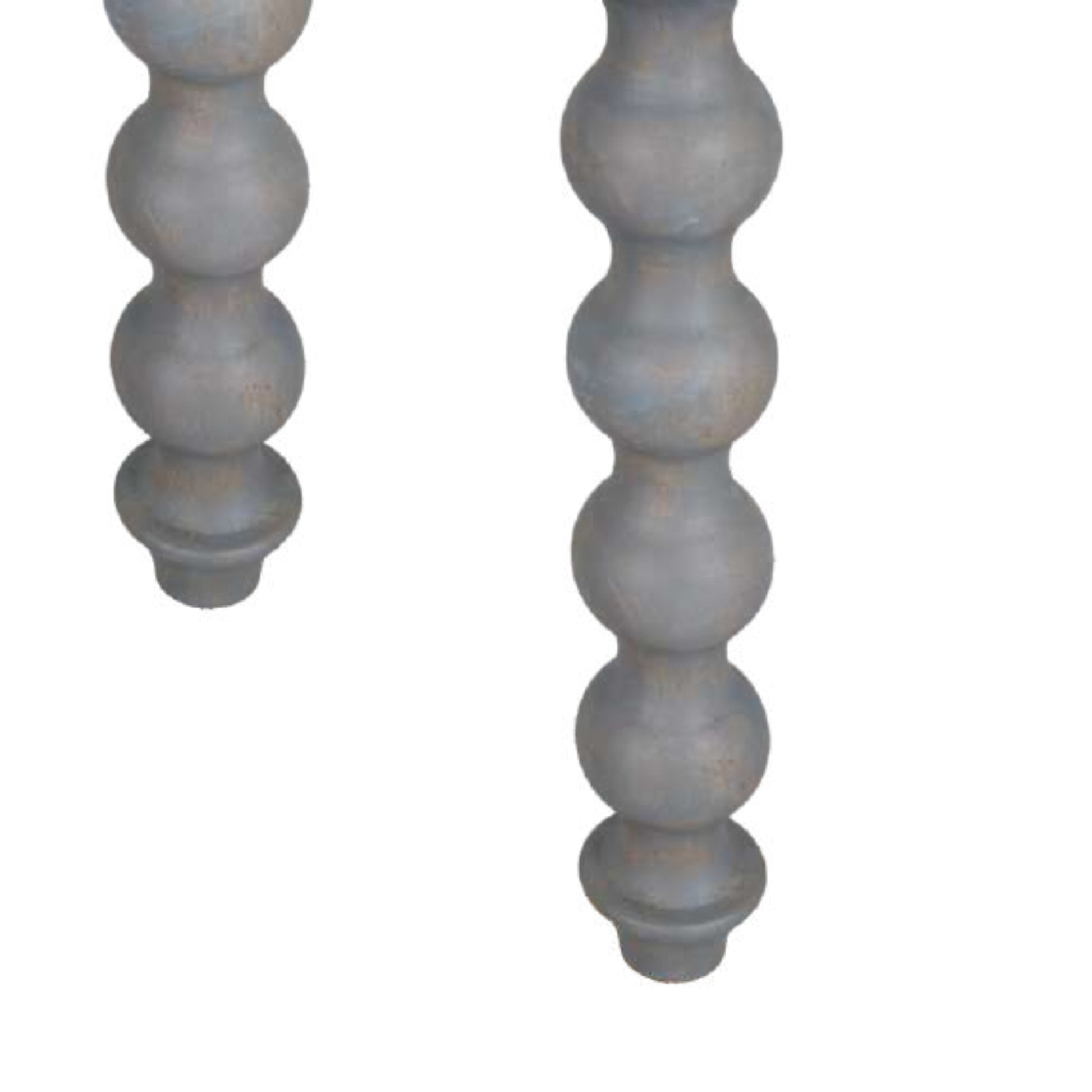 Two wooden bobbin design legs with a textured surface on a white background