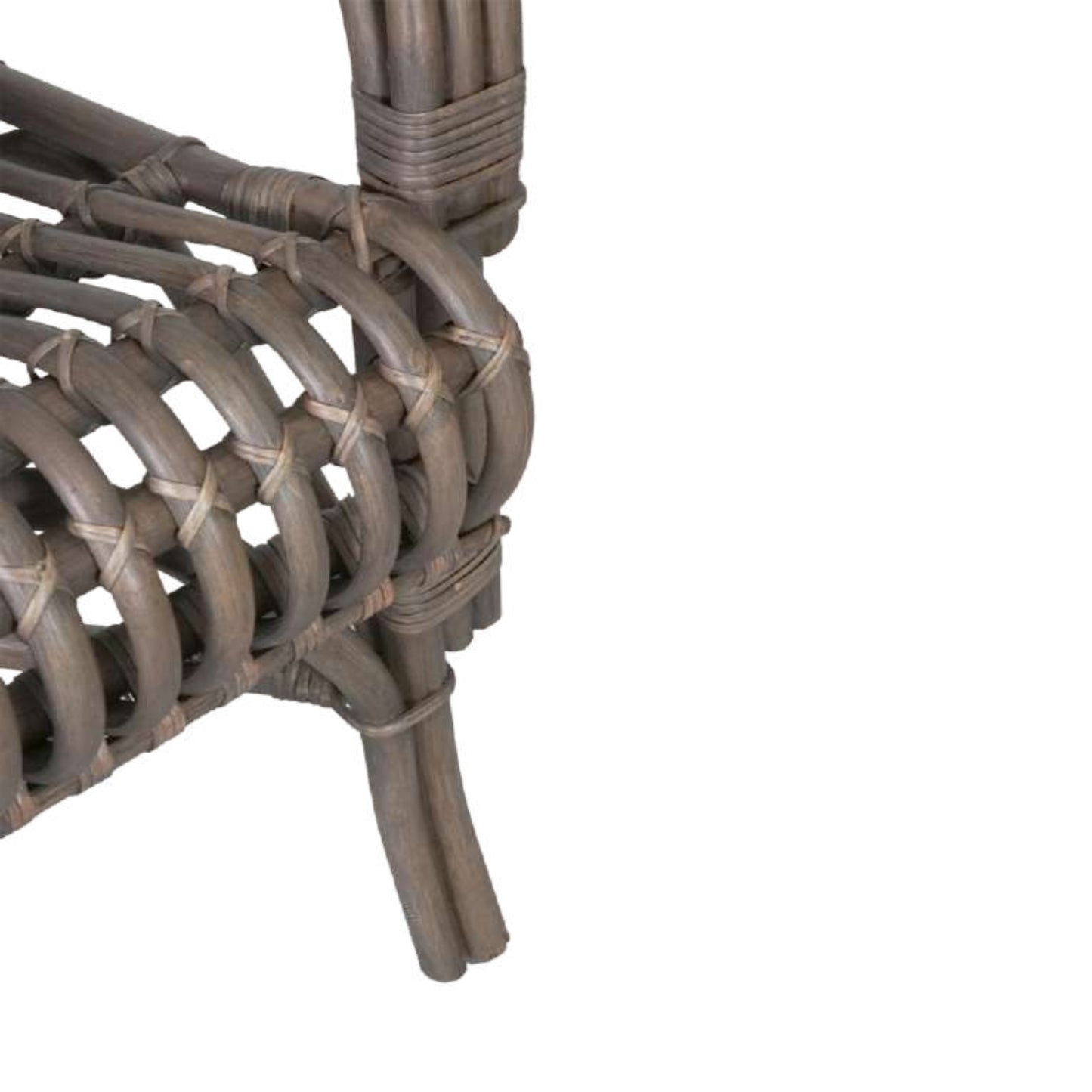 Close-up of a wicker chair's armrest and seat on a white background