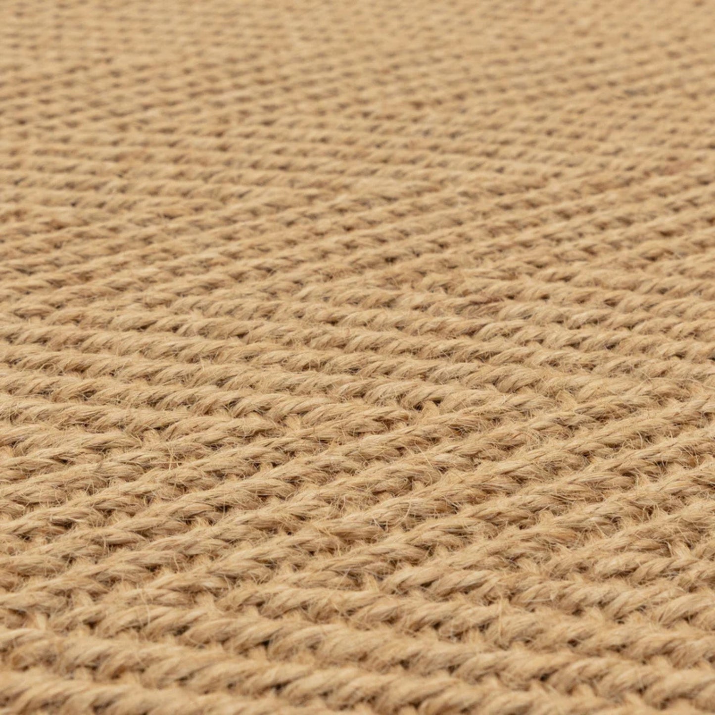 Close-up of a textured beige fabric surface