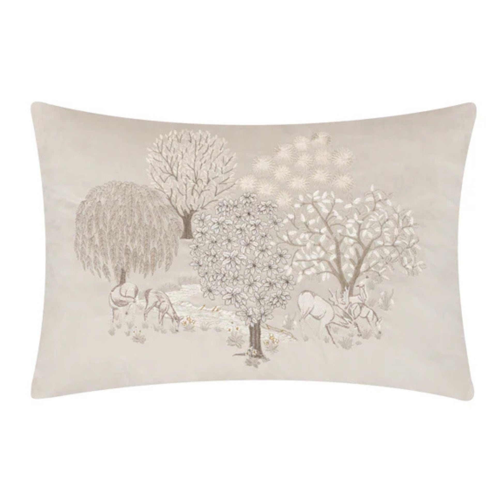 Decorative pillow with tree and animal design on a beige background
