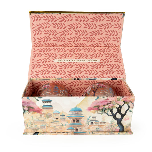 Decorative box with 'The Silk Road Collection' design on a white background