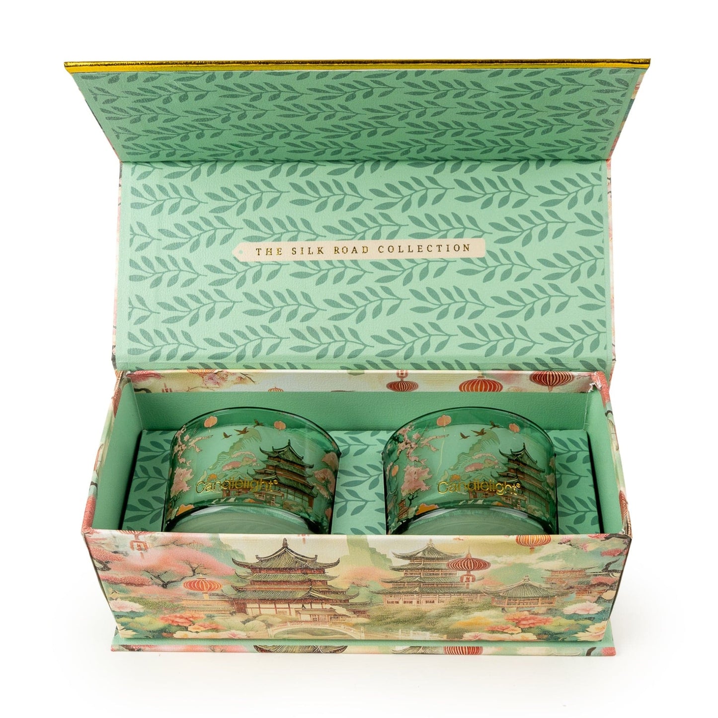 Open box containing candlessets with 'The Silk Road Collection' branding