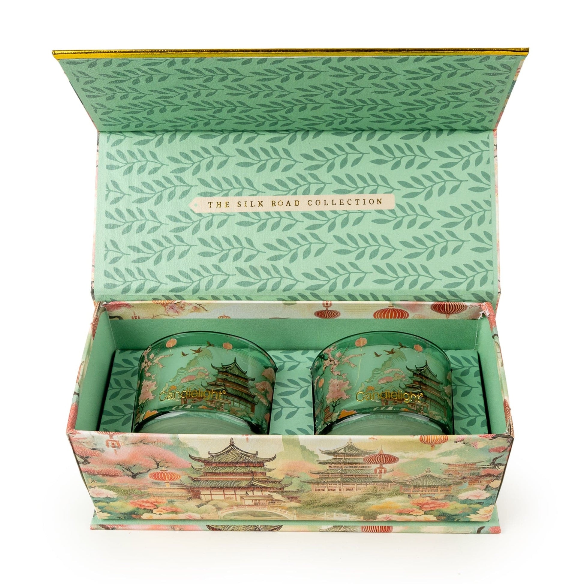 Open box containing candlessets with 'The Silk Road Collection' branding