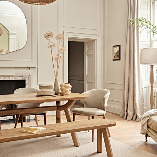 Modern living room with wooden furniture and neutral decor