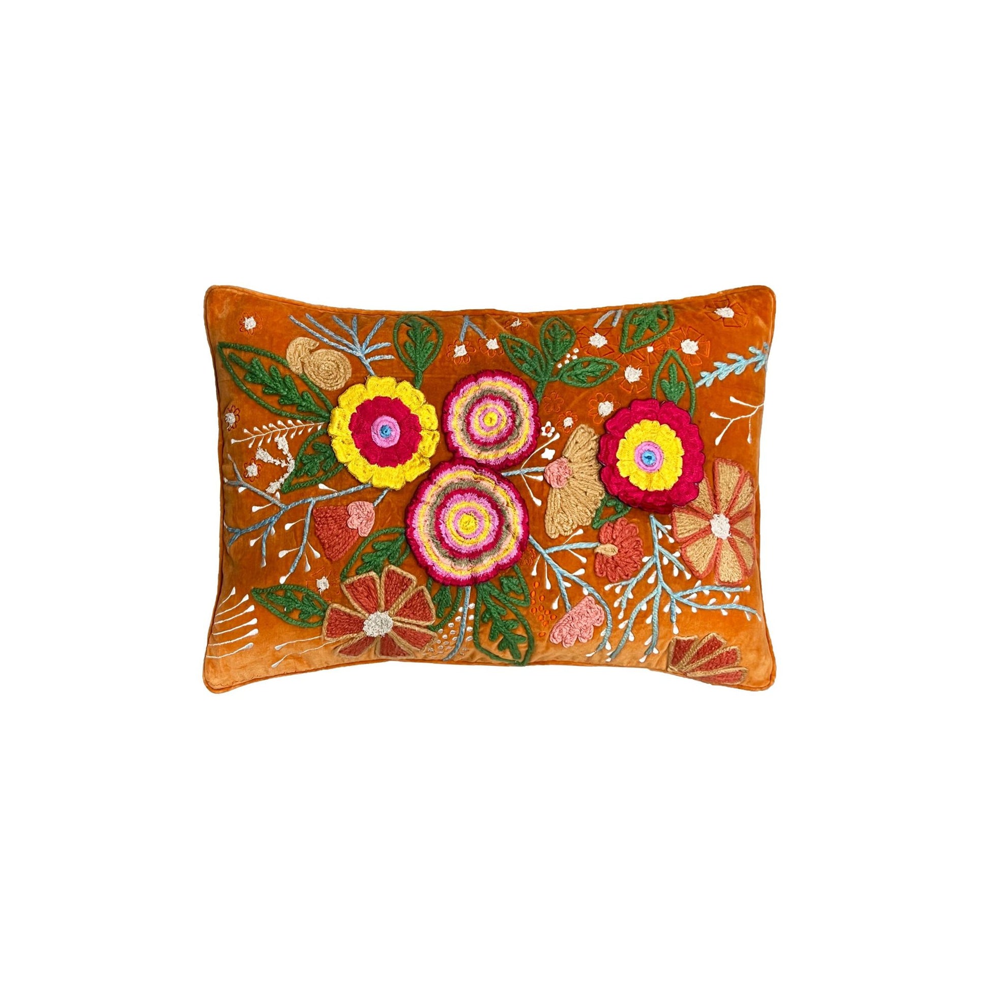 An ornately embroidered velvet cushion with a rich orange base and colourful floral patterns on it, featuring a luxurious feather filling.