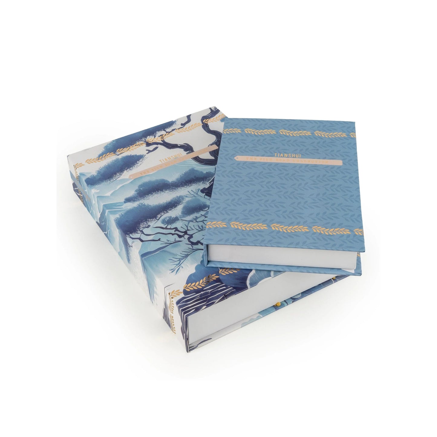 Blue book with floral design on a white background