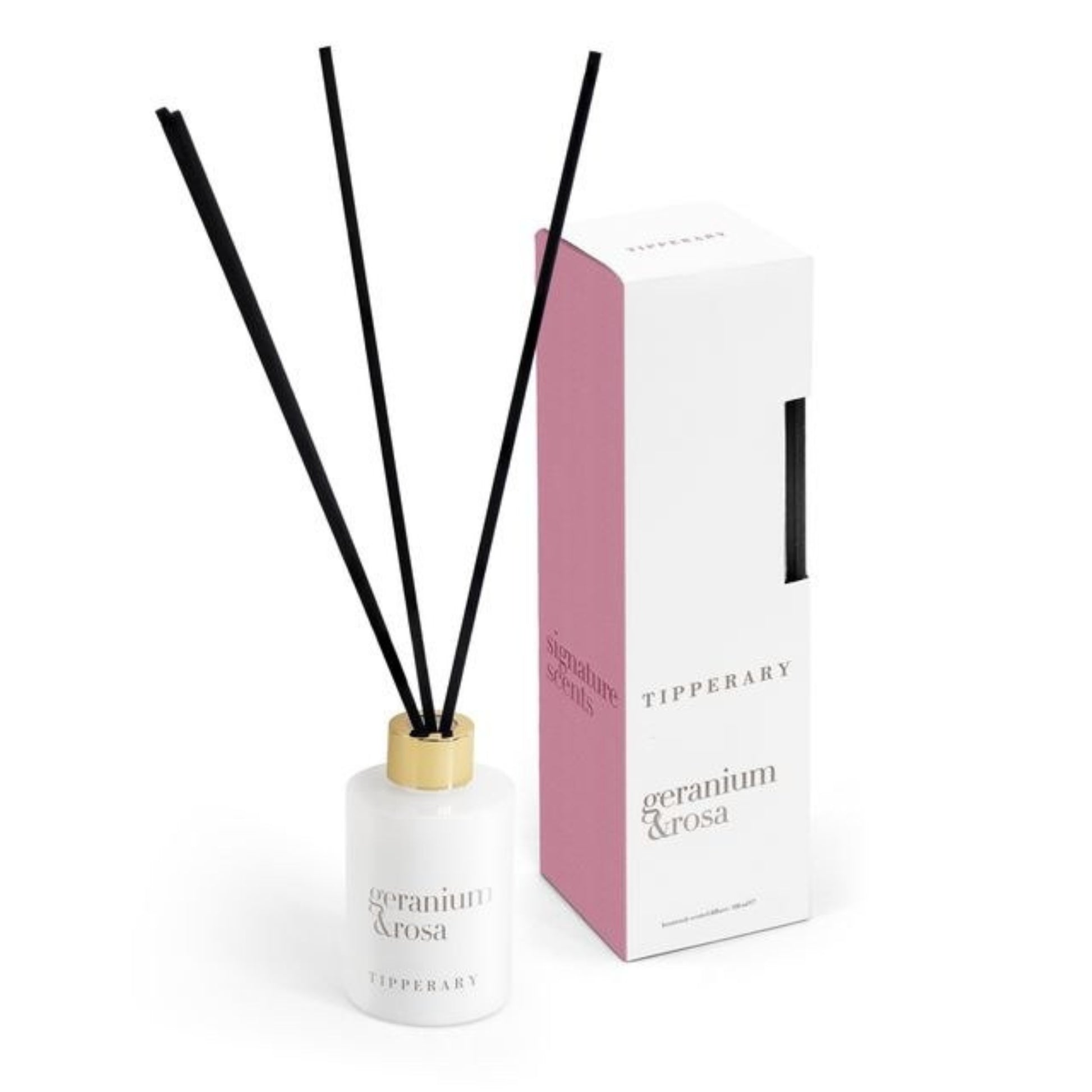 Diffuser with black sticks and white container, next to a pink and white box on a white background