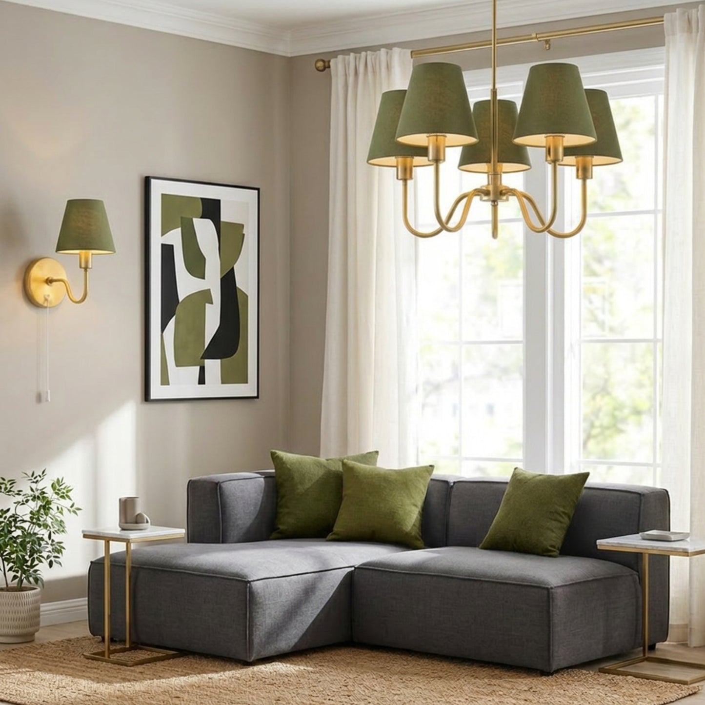 Modern living room with gray sectional sofa, green cushions, and a chandelier.