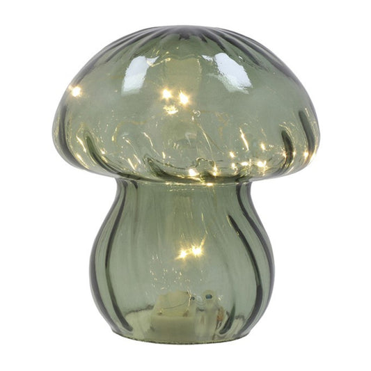 Mushroom-shaped glass lamp with LED lights on a white background