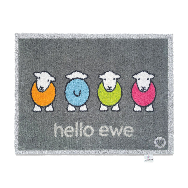 Hug Rug washable grey door mat with 4 sheep with colourful bodies and hello ewe printed underneath them