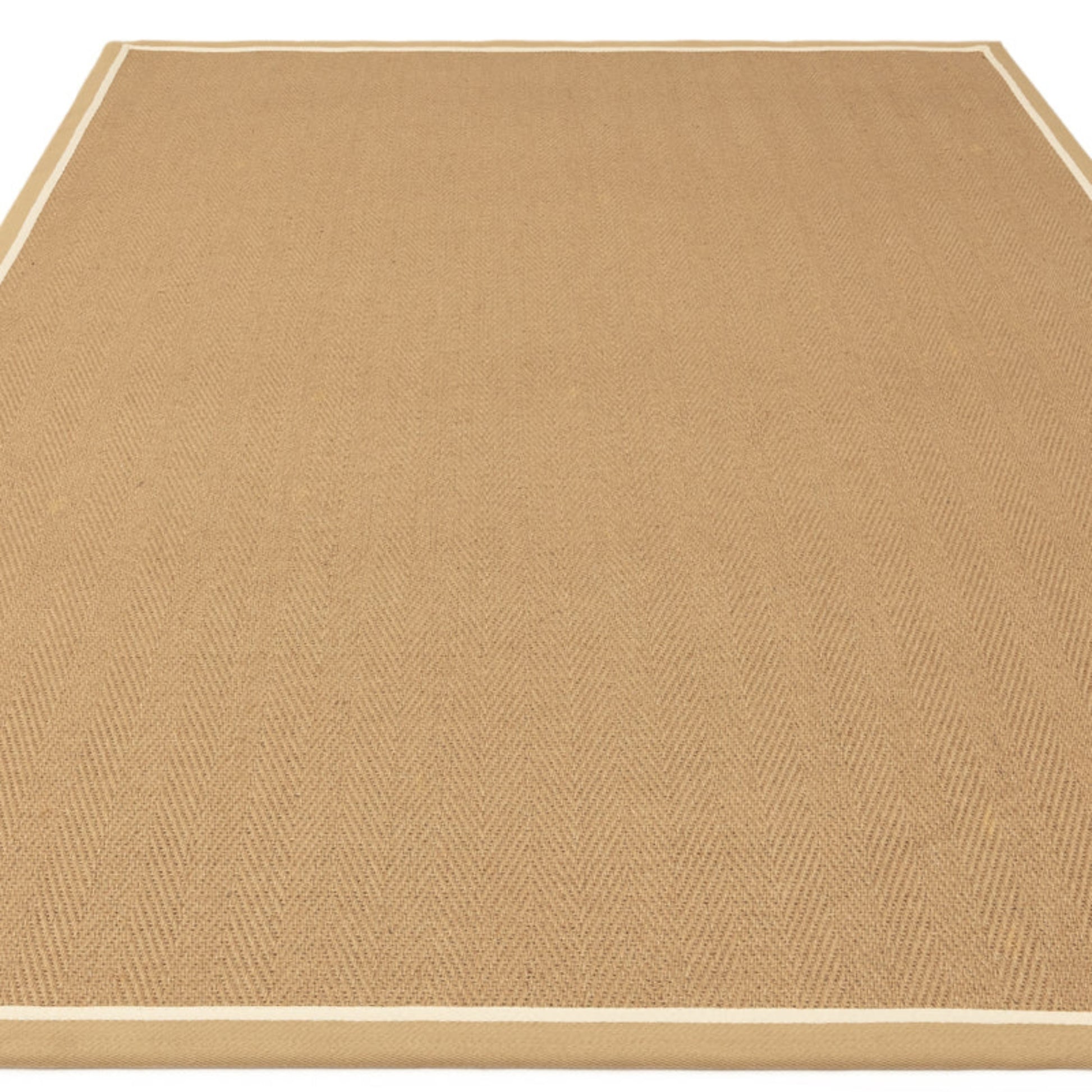 Beige rug with a subtle pattern on a white background