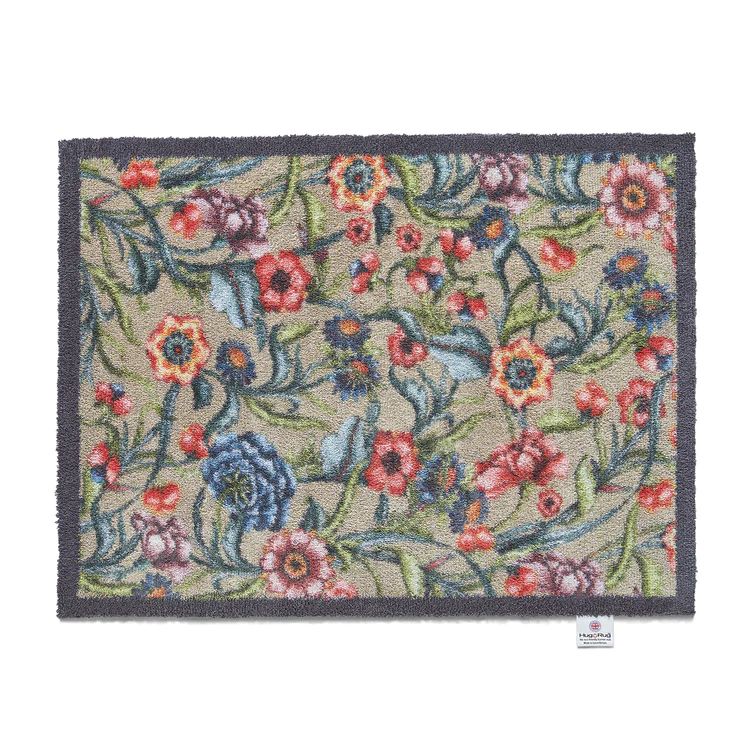 Hug Rug washable doormat with a multi floral pattern design 