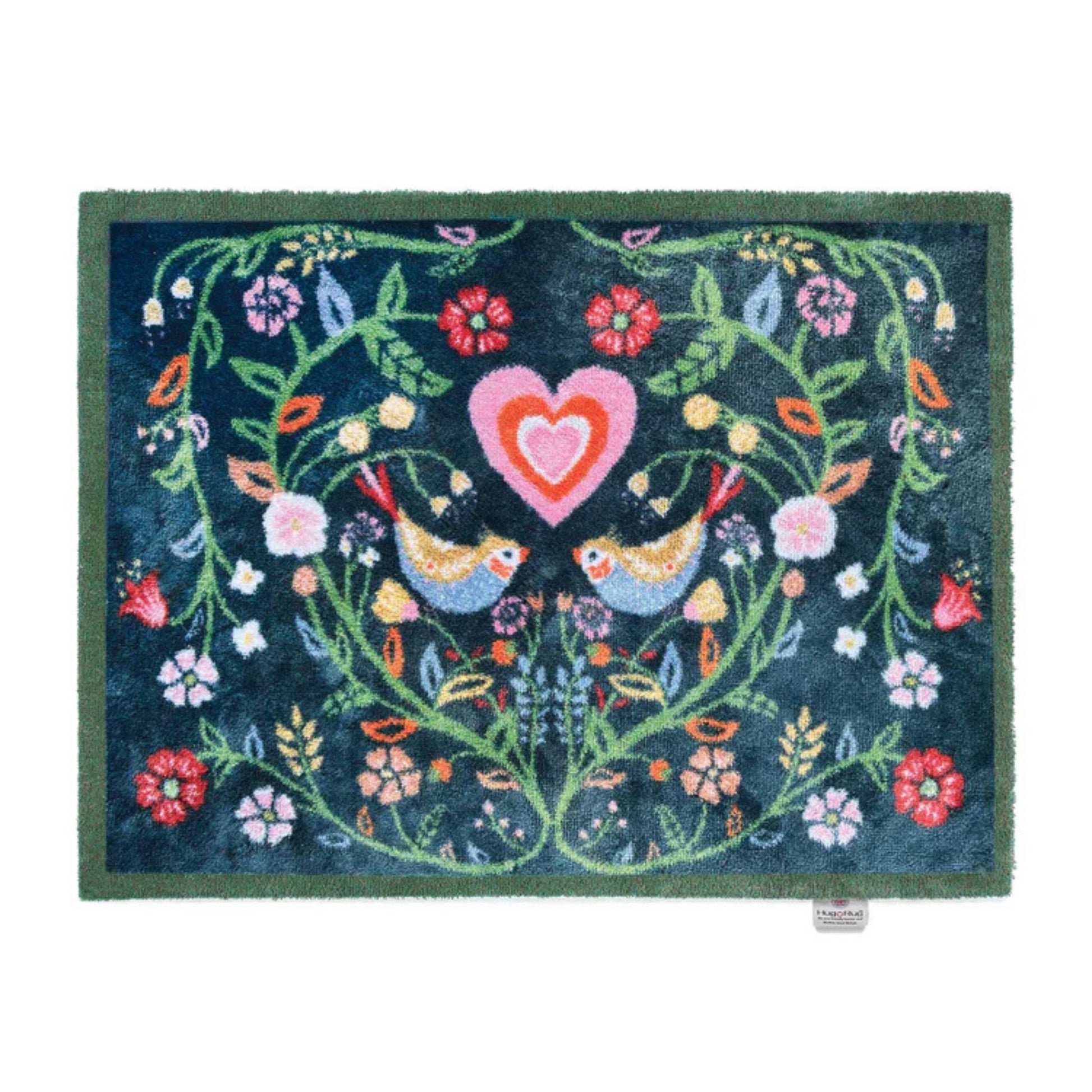 Decorative mat with birds and a heart design on a blue background