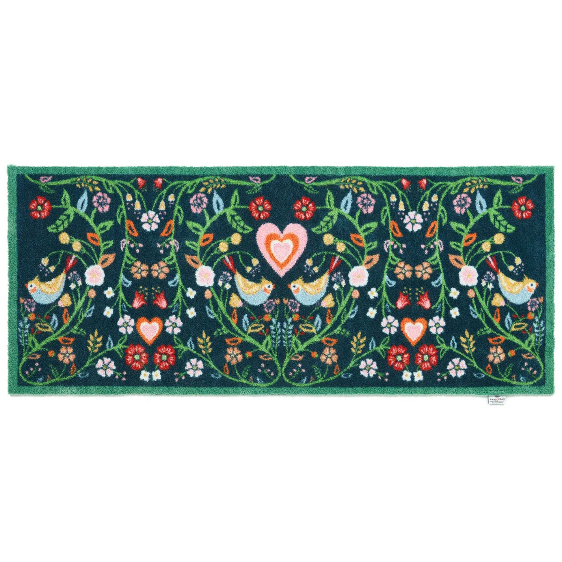 Decorative mat with birds and a heart design on a blue background